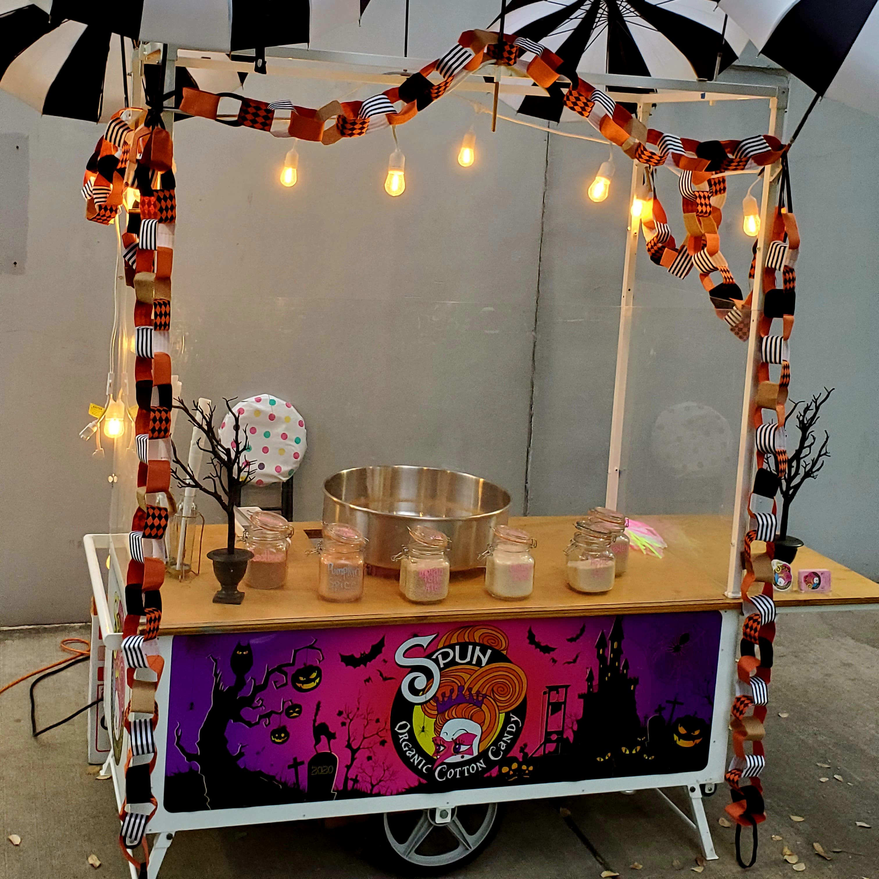 cotton candy cart with halloween themed sign